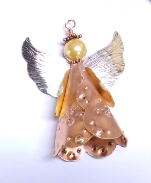 Judy Larson's Angel Ornament  - Make a Prototype:, Holiday Designs, Cutting, Cutting Tool, Cutters, Forging, Forging Jewelry, Jewelry Forging, How To Punch Holes, Hole Punching, Punch A Hole, Stamping, Stamps, Texturing, The stamping should have been closer to the edge of the skirt.